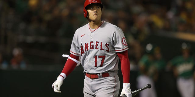 Shohei Ohtani, #17 of the Los Angeles Angels, looks on during the game against the Oakland Athletics at RingCentral Coliseum on Oct. 04, 2022 in Oakland, California.