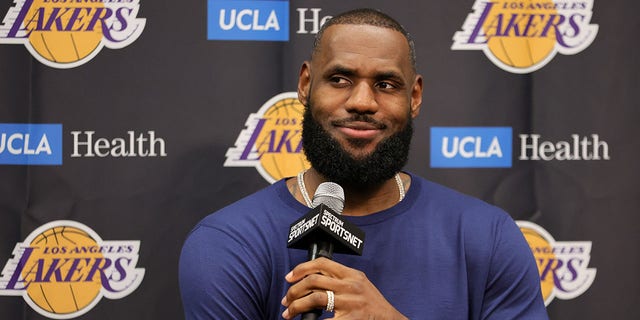 LeBron James, #6 of the Los Angeles Lakers, smiles during a news conference after a preseason game against the Phoenix Suns at T-Mobile Arena on Oct. 5, 2022 in Las Vegas. The Suns defeated the Lakers 119-115.