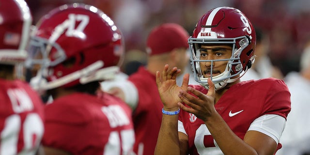 Bryce Young of the Alabama Crimson Tide cheers on the team during pregame warmups prior to facing the Texas A and M Aggies at Bryant-Denny Stadium Oct. 8, 2022, in Tuscaloosa, Ala. 