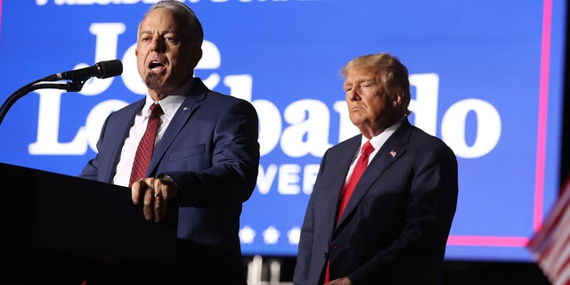 The Republican nominee for Nevada governor, Joe Lombardo, joins former President Donald Trump for a campaign rally on Oct. 8, 2022, in Minden, Nevada.