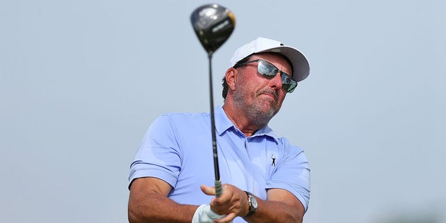 Team Captain Phil Mickelson of Hy Flyers GC plays his shot from the ninth tee during Day Three of the LIV Golf Invitational - Bangkok at Stonehill Golf Course on Oct. 9, 2022 in Pathum Thani, Thailand. 