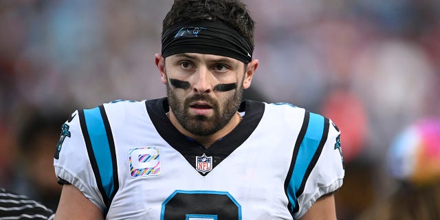 Baker Mayfield, #6 of the Carolina Panthers, walks off the field at halftime against the San Francisco 49ers at Bank of America Stadium on Oct. 9, 2022 in Charlotte, North Carolina.
