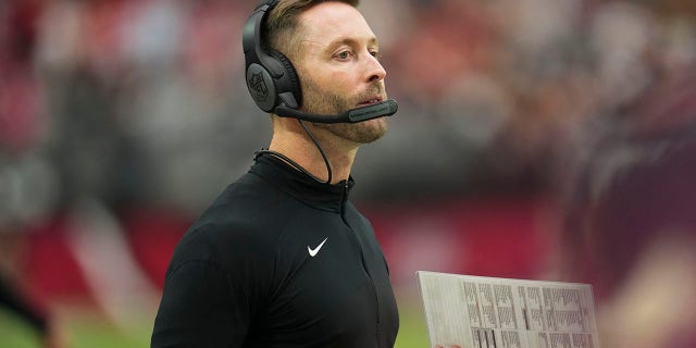 Head coach Kliff Kingsbury of the Arizona Cardinals looks down the field against the Philadelphia Eagles at State Farm Stadium Oct. 9, 2022, in Glendale, Ariz. 