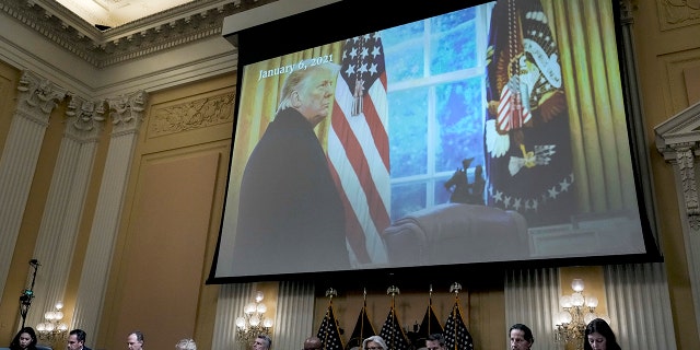 WASHINGTON, DC - OCTOBER 13: An image of former President Donald Trump is displayed during a hearing in the Cannon House Office Building on October 13, 2022 in Washington, DC. 