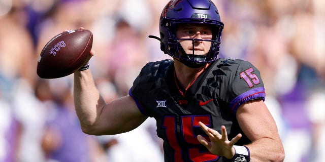 Max Duggan, #15 of the TCU Horned Frogs, throws against the Oklahoma State Cowboys during the first half at Amon G. Carter Stadium on Oct. 15, 2022 in Fort Worth, Texas.