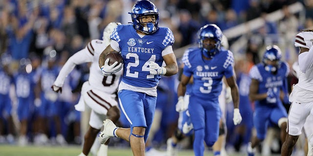 Chris Rodriguez Jr (24) of the Kentucky Wildcats runs with the ball against the Mississippi State Bulldogs at Kroger Field Oct. 15, 2022, in Lexington, Ky. 