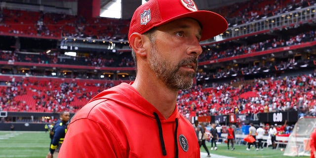 San Francisco 49ers head coach Kyle Shanahan leaves the field after a game against the Atlanta Falcons at Mercedes-Benz Stadium in Atlanta on October 16, 2022.