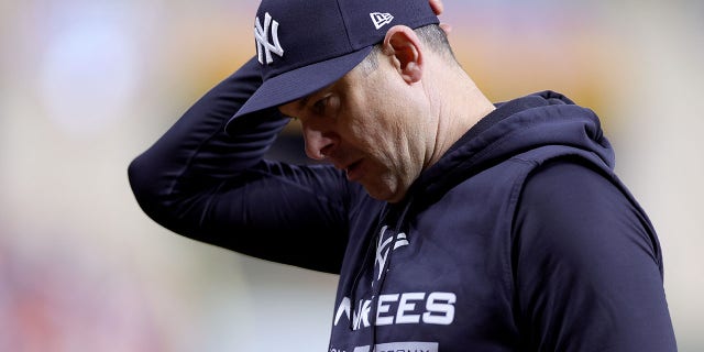 Manager Aaron Boone No. 17 of the New York Yankees reacts against the Houston Astros in the eighth inning of the second game of the American League Championship Series at Minute Maid Park on October 18. 20, 2022 in Houston, Texas.