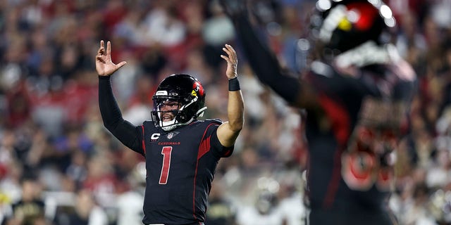 Arizona Cardinals No. 1 Kyler Murray celebrates after returning a touchdown during the second half of a game against the New Orleans Saints in a game at State Farm Stadium on October 20, 2022 in Glendale, Arizona. 