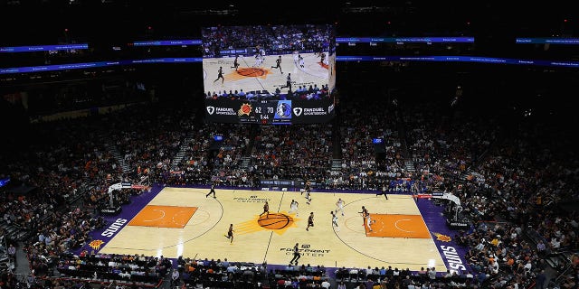 Action during the second half of the NBA game between the Phoenix Suns and the Dallas Mavericks at Footprint Center on October 19, 2022, in Phoenix, Arizona. The Suns defeated the Mavericks 107-105. 