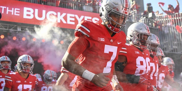 Quarterback C.J. Stroud, #7 of the Ohio State Buckeyes, leads his team onto the field before playing the Iowa Hawkeyes at Ohio Stadium on Oct. 22, 2022 in Columbus, Ohio. 