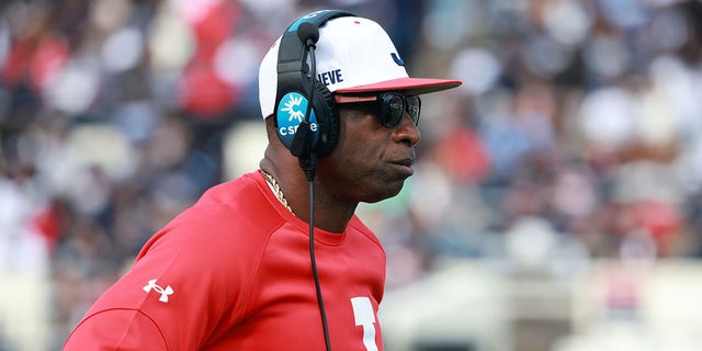 Jackson State coach Deion Sanders surveys the playing field during Campbell's game at Mississippi Veterans Memorial Stadium on October 21, 2022 in Jackson.
