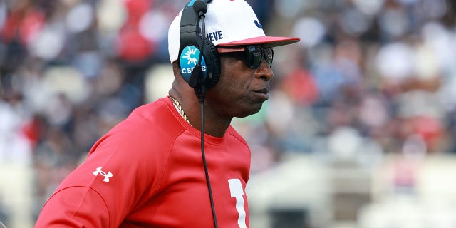 Jackson State coach Deion Sanders surveys the playing field during Campbell's game at Mississippi Veterans Memorial Stadium on October 21, 2022 in Jackson.