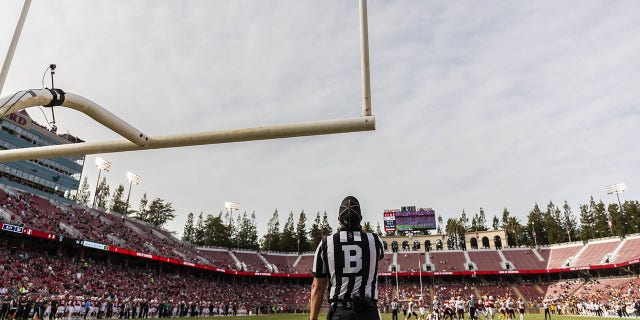 Back Judge Justin Nelson watches a field goal attempt by Joshua Karty, #43 of the Stanford Cardinal, during the third quarter of an NCAA Pac-12 college football game against the Arizona State Sun Devils on Oct. 22, 2022 at Stanford Stadium in Palo Alto, California.