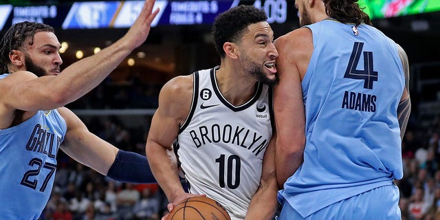 Ben Simmons of the Brooklyn Nets goes to the basket against Steven Adams of the Grizzlies at FedExForum on Oct. 24, 2022, in Memphis, Tennessee.