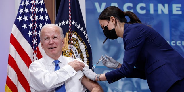 U.S. President Joe Biden receives his updated COVID-19 booster in the South Court Auditorium at the White House campus on October 25, 2022, in Washington, DC. Biden delivered remarks on the status of Covid-19 in the United States. 