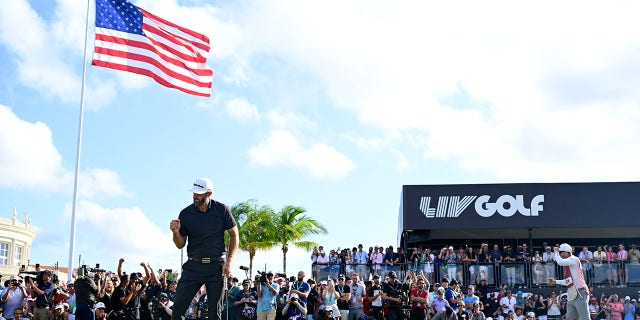 Team Captain Dustin Johnson of 4 Aces GC celebrates on the 18th green during the LIV Golf Invitational - Miami Tag Team Championship round at Trump National Doral Miami on October 30, 2022 in Doral, Florida.