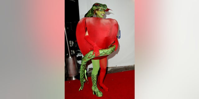 Halloween queen Heidi Klum teases 'claustrophobic' costume ahead of famous party's return 2 Heidi Klum dressed up as a forbidden fruit for her seventh annual party.