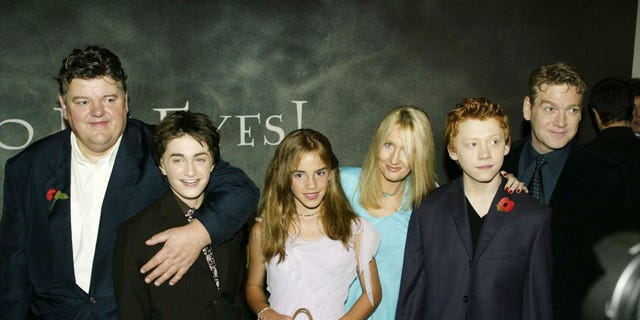 Arriving for the world premiere of "Harry Potter and the Chamber of Secrets" at the Odeon Leicester Square, Nov. 3, 2002, in London, are, from left, Robbie Coltrane, Daniel Radcliffe, Emma Watson, J.K. Rowling, Rupert Grint and Kenneth Branagh.