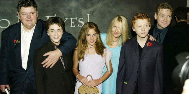 Arriving for the world premiere of "Harry Potter and the Chamber of Secrets" at the Odeon Leicester Square, Nov. 3, 2002, in London, are, from left, Robbie Coltrane, Daniel Radcliffe, Emma Watson, J.K. Rowling, Rupert Grint and Kenneth Branagh.