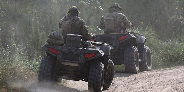 Texas Rangers patrol near the Rio Grande for immigrants crossing illegally into the U.S. from Mexico.  