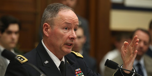 U.S. Army Gen. Keith Alexander, Director of the National Security Agency, and commander of the U.S. Cyber Command, testifies during a House Armed Services Committee hearing on Capitol Hill, March 12, 2014, in Washington, D.C.  