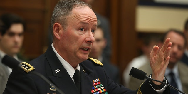 U.S. Army Gen. Keith Alexander, Director of the National Security Agency, and commander of the U.S. Cyber Command, testifies during a House Armed Services Committee hearing on Capitol Hill, March 12, 2014, in Washington, D.C.  