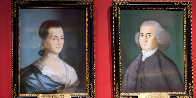 Paintings of former U.S. President John Adams, right, and his wife Abigail Adams, are displayed at the Massachusetts Historical Society in Boston, Massachusetts, on Monday, June 29, 2015. Here in acid-free, low-humidity stacks are 13 million pages of the personal letters and diaries of men and women who helped create the world we live in. They were the first president and first lady to live in the White House.