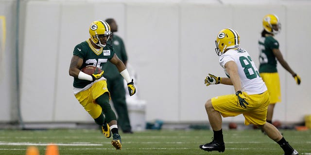Antonio Dennard #35 of the Green Bay Packers runs through drills during rookie mini camp at Don Hudson Center on May 16, 2014 in Green Bay, Wisconsin. 