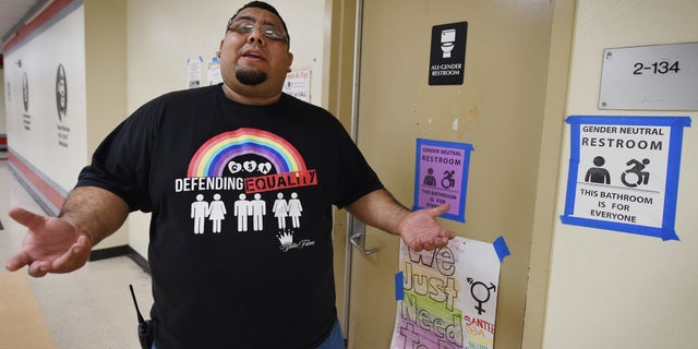 Santee High School Dean Jose Lara talks to reporters about transgender issues outside the school's gender neutral restroom in Los Angeles, CA on May 4, 2016.