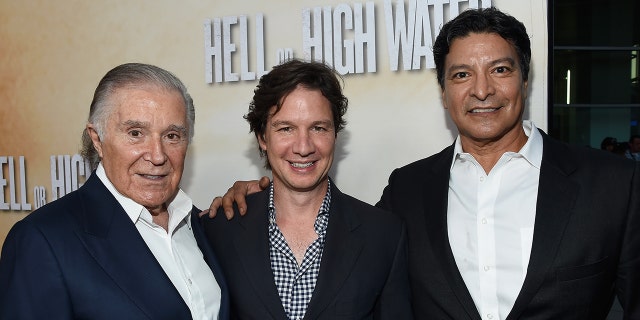 This file photo shows producers Sidney Kimmel, John Penotti and actor Gil Birmingham arrive at the Los Angeles Red Carpet Screening Of "Hell Or High Water" at ArcLight Cinemas on August 10, 2016, in Hollywood, California.
