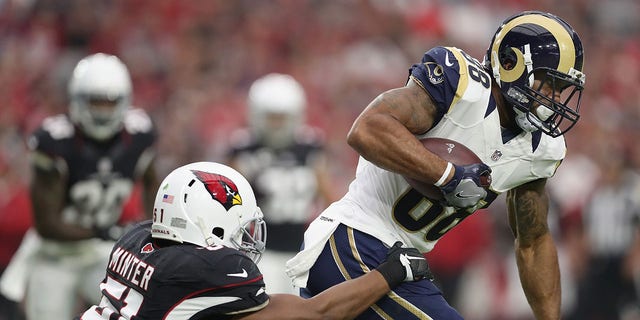 Tight end Lance Kendricks of the Los Angeles Rams carries the ball against the Cardinals on Oct. 2, 2016, in Glendale, Arizona.  