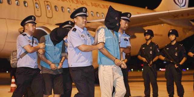 Suspected telecom scams are brought back to China from Cambodia as the CCP cracks down on fraud committed by its citizens overseas.