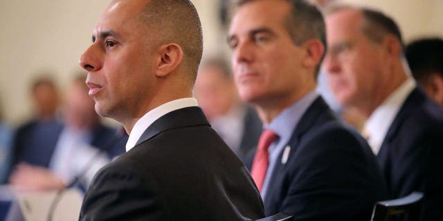 (L-R) Providence, Rhode Island, Mayor Jorge Elorza; Los Angeles Mayor Eric Garcetti; and Anaheim, California, Mayor Tom Tait participate in a meeting about immigration during the U.S. Conference of Mayors' 86th annual Winter Meeting at the Capitol Hilton January 25, 2018 in Washington, DC.