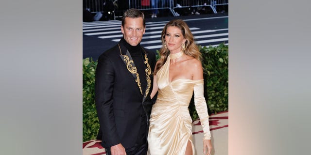 Gisele Bundchen stunned in gold at the 2018 Met Gala.