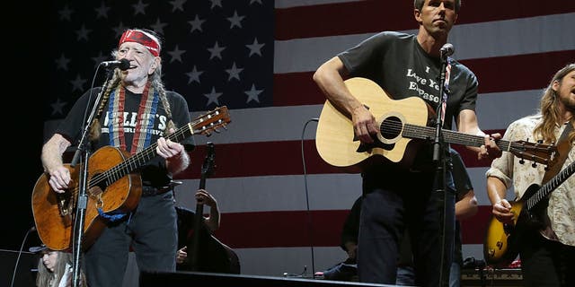 Ahead of Styles' concert, O'Rourke was endorsed by Willie Nelson during a "Vote ‘Em Out" campaign rally in South Austin. O'Rourke and Nelson are pictured in 2018.