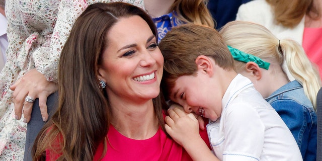 Kate, now the Princess of Wales, and her son, Prince Louis, attend the Platinum Pageant on The Mall on June 5, 2022, in London.