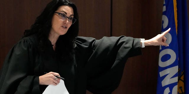 Waukesha County Circuit Court Judge Jennifer Dorow addresses Darrell Brooks as he appears in a Waukesha County Circuit Court prior to jury selection in Waukesha, Monday, Oct. 3, 2022. Brooks, who is representing himself at trial, is charged with hit and run in the Waukesha Christmas Parade last year killed six people and injured dozens more. He faces six counts of first-degree intentional homicide and 71 other counts. - Mike De Sisti / The Milwaukee Journal Sentinel