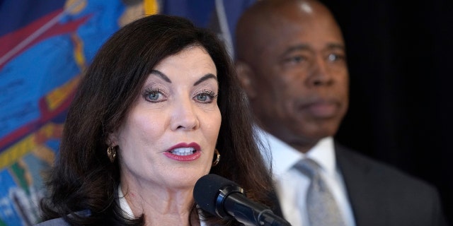 New York Governor Kathy Hochul, left, speaks and is joined by New York City Mayor Eric Adams.