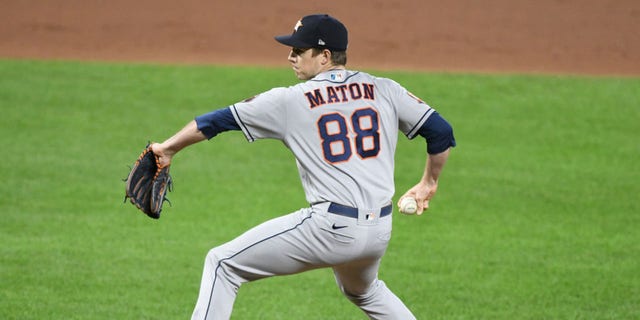 Phil Maton of the Houston Astros pitches during a game against the Baltimore Orioles at Oriole Park at Camden Yards Sept. 23, 2022, in Baltimore.