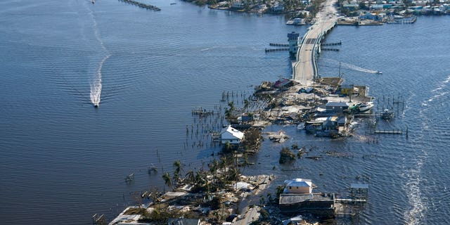 The bridge leading from Fort Myers to Pine Island, Florida, is heavily damaged in the aftermath of Hurricane Ian, Saturday, Oct. 1, 2022. 