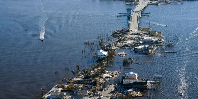 The bridge leading from Fort Myers to Pine Island, Florida, is heavily damaged in the aftermath of Hurricane Ian, Saturday, Oct. 1, 2022. 