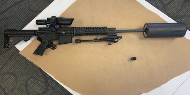 An image in a federal complaint is referred to as a .  shown as described "The Sig Sauer M400 300 Blackout rifle is attached to the barrel using an oil filter adapter with an oil filter-type silencer."