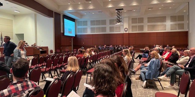 Parents and educators spoke out in support or against a transgender student policy at a school board meeting in Loudoun County, Virginia.