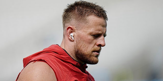 Arizona Cardinals defensive end J.J. Watt warms up before an NFL football game against the Carolina Panthers on Sunday, Oct. 2, 2022, in Charlotte, North Carolina. 