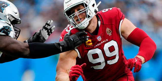 Arizona Cardinals defensive end J.J. Watt plays against the Carolina Panthers during the first half of an NFL football game on Sunday, Oct. 2, 2022, in Charlotte, North Carolina. 