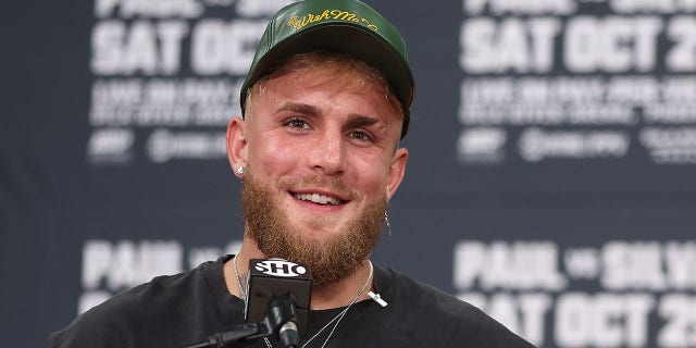 Jake Paul speaks during a Jake Paul v Anderson Silva press conference at Gila River Arena on September 13, 2022 in Glendale, Arizona.