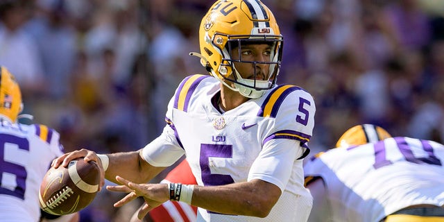 LSU quarterback Jayden Daniels (5) looks to throw during the first half of an NCAA college football game against Mississippi in Baton Rouge, La., Saturday, Oct. 22, 2022. 