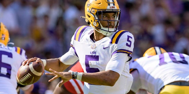 LSU quarterback Jayden Daniels (5) looks to throw during the first half of an NCAA college football game against Mississippi in Baton Rouge, La., Saturday, Oct. 22, 2022.