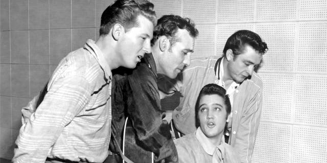 From left, Jerry Lee Lewis, Carl Perkins, Elvis Presley and Johnny Cash gather on Dec. 4, 1956, in Memphis, Tennessee.